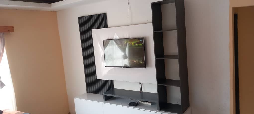 Entertainment wall unit by Teezet Woodworks