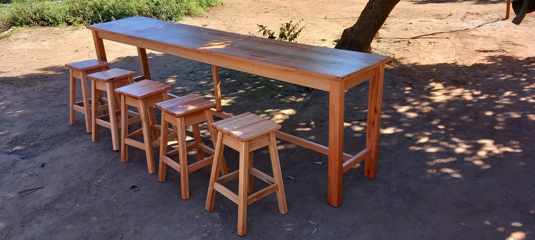 Long table and stool set by Teezet Woodworks